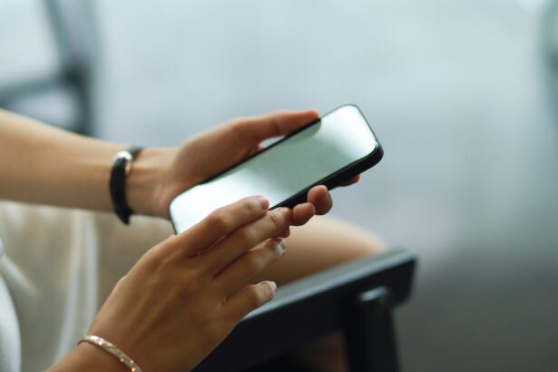 A person holding a smartphone in both hands.